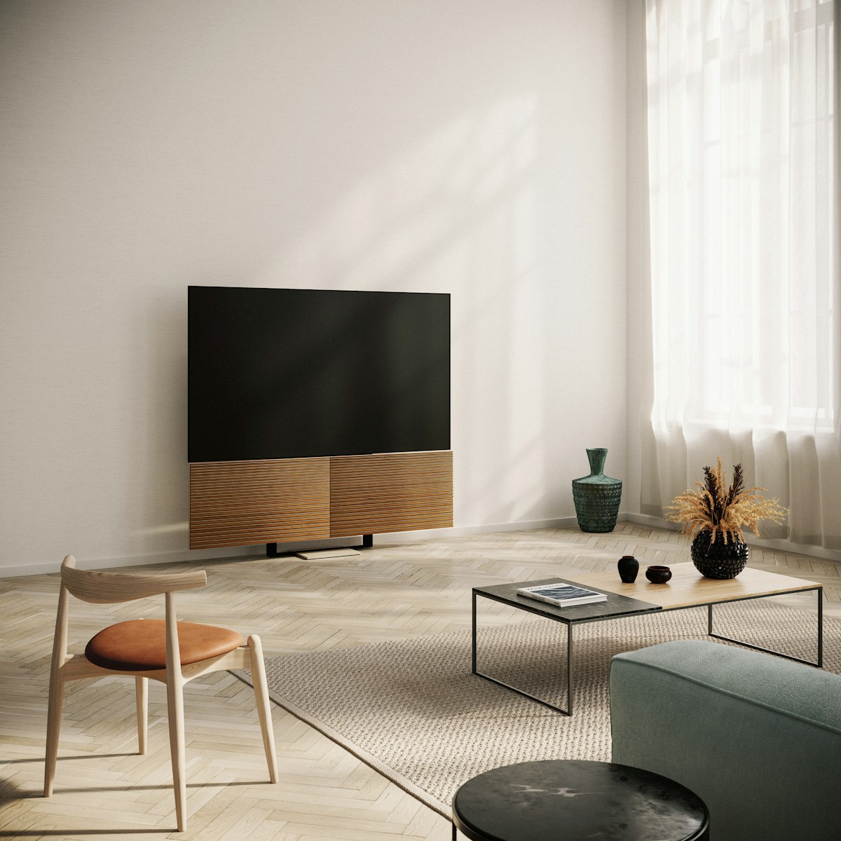 black flat screen tv on brown wooden tv rack